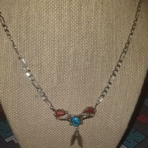 Sterling silver turquoise and coral necklace.